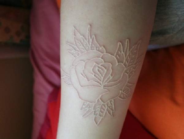 white ink tattoo flower White Ink Tattoos Design ideas