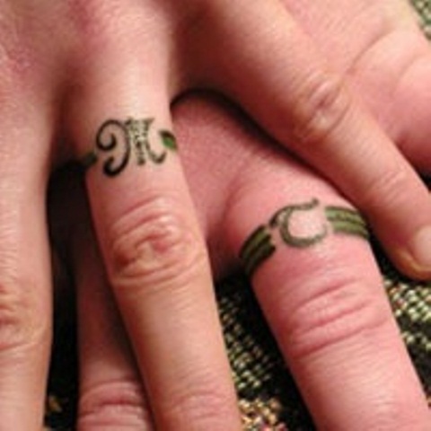awesome wedding ring tattoos 12 Ring Tattoos Design Ideas