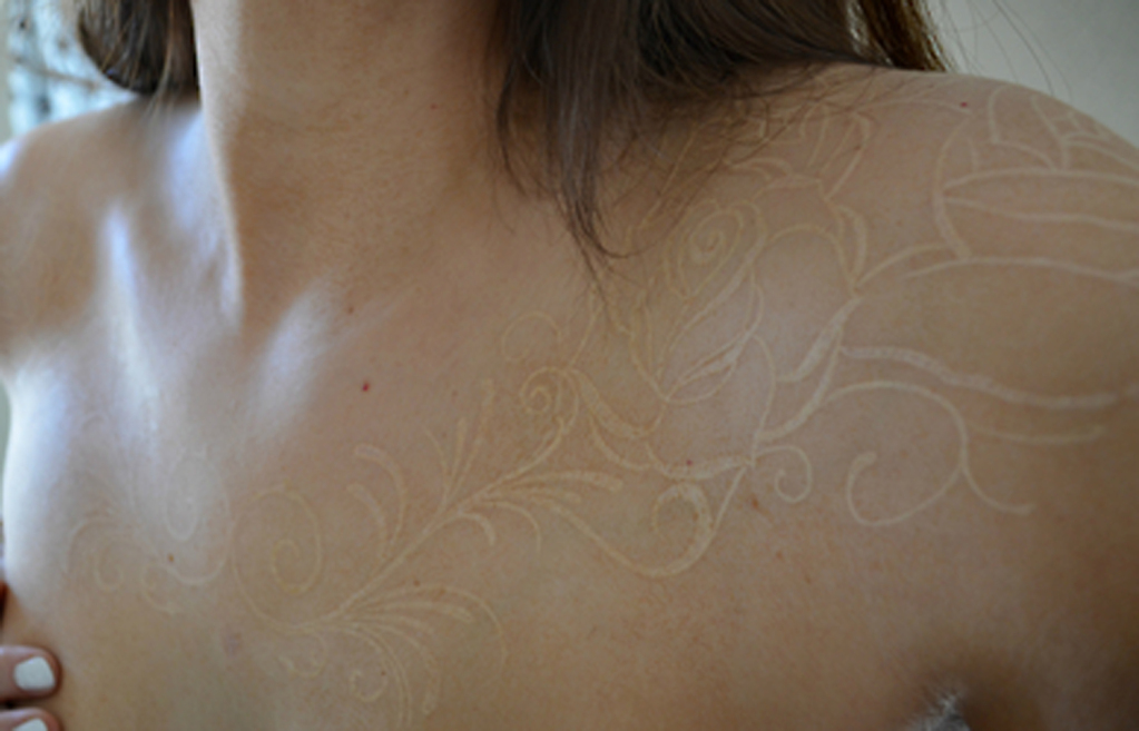 big white ink tattoo on chest White Ink Tattoos Design ideas