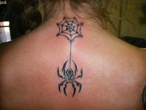 riding spider tattoo Spider Tattoo Design Ideas